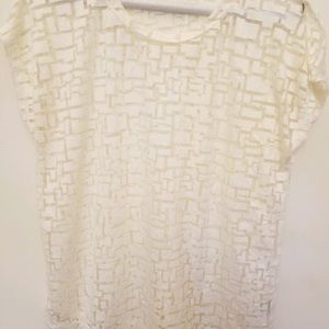 Cream see through design top. Very cute with cami.
